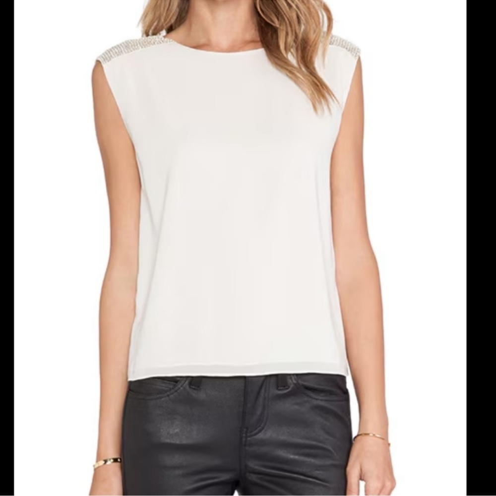 Alice + Olivia White Sleeveless balka silk blouse
Perfect condition.